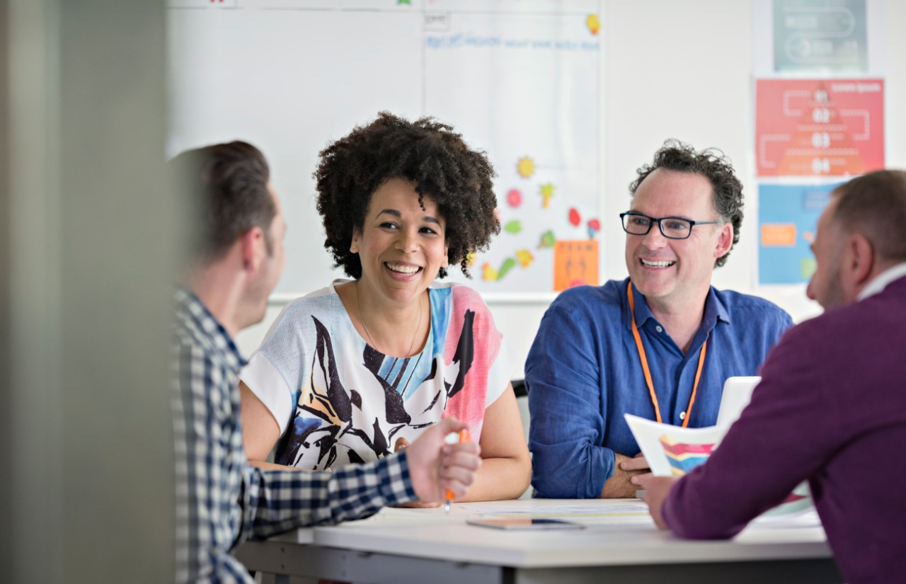 Business people having meeting in tech start-up office